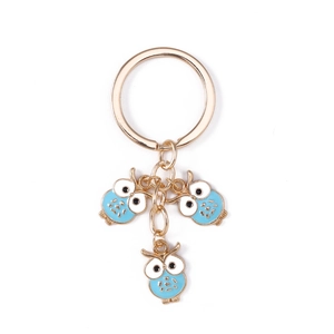 Porte-clés chouette mignon en alliage doré avec trois breloques en émail bleu