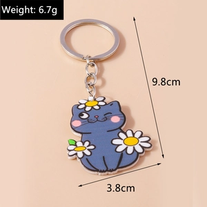 Détails du porte-clés chat en acrylique bleu avec marguerites et dimensions précises