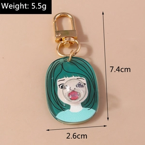 Detailed size view of the 7.4cm cartoon girl keychain with gold spring buckle