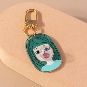 Detail of creative girl keychain with 3D bubble charm and gold metal lobster clasp