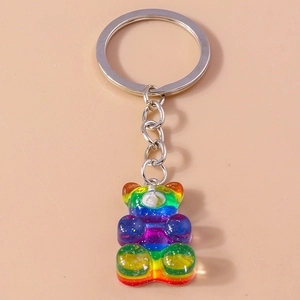 Porte-clés ourson en dégradé arc-en-ciel avec anneau argenté et paillettes brillantes