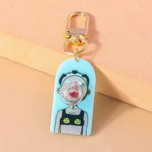 Macro shot of creative acrylic keychain featuring cartoon character with 3D bubble detail