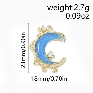 Detailed size view of gold moon crescent pendant with blue glitter and 5 hanging loops
