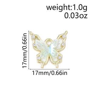 Macro view of crystal butterfly pendant showing 17mm size and 1.0g weight specifications