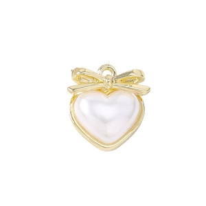 Pendentif cœur doré avec nacre blanche et nœud élégant pour création de bijoux