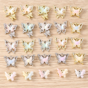 Colorful resin butterfly charms with rhinestone flower accents for jewelry making and DIY
