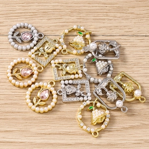 DIY jewelry making set with rhinestone flower pendants and pearl tulip charms for bracelets