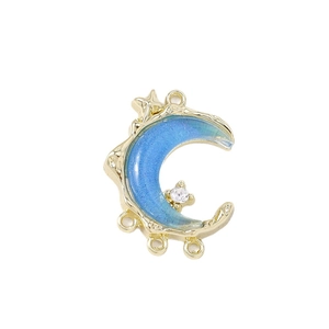 Golden crescent moon pendant with blue glitter resin and stars for DIY jewelry