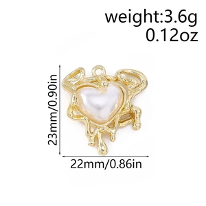 Lava style gold metal heart pendant with white pearl inlay, 23mm size detail view