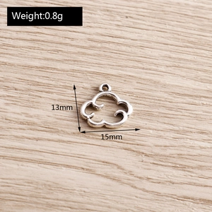 Detail view of silver hollow cloud charm for DIY jewelry showing 13mm by 15mm dimensions