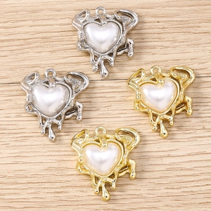 DIY liquid metal heart pendants with white pearls for necklaces and bracelets