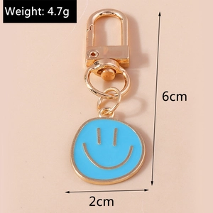 Porte-clés créatif avec anneau doré et breloque sourire en émail bleu clair, taille 6cm 4,7g