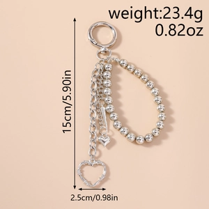 Detail showing metallic heart pendants and bead chains with length and weight measurements