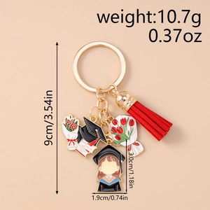 Graduation keychain details with cartoon figure and tassel showing 9cm length dimensions