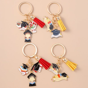 Fashion graduation keychain set with colorful tassels and enamel cartoon charms