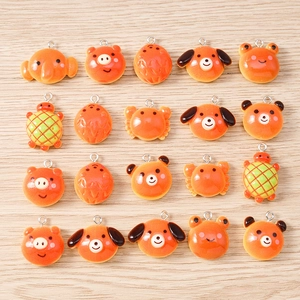 Pack of 20 assorted orange resin animal pendants for DIY jewelry with silver metal rings