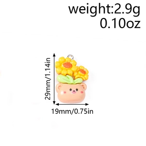 Detailed view of sunflower resin pendant in bear pot with weight and size markings