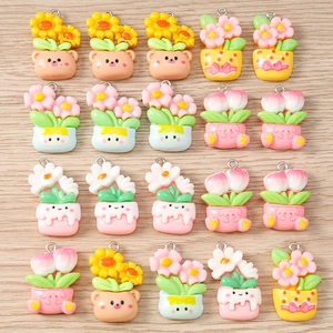 Detail of colorful resin floral flower charms for DIY jewelry making and pendants
