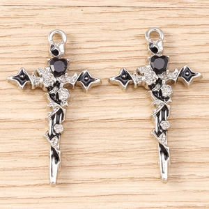 Gothic silver cross pendant with black heart gemstone and rose vine details