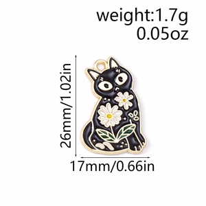 Detailed size view of black enamel cat charm with daisy flowers, 26mm by 17mm