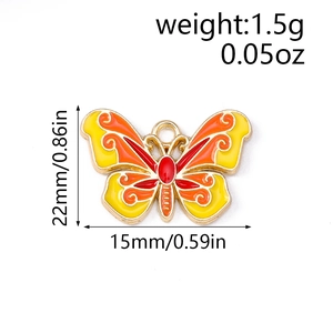 Detail of colorful enamel butterfly pendant showing 22mm x 15mm dimensions and top ring