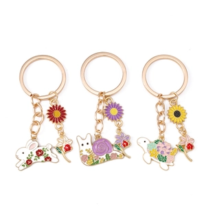 Fashionable enamel keychain charms featuring cute rabbit, snail and turtle with floral details