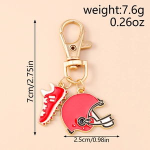 Detail view of American football helmet and shoe keychain charm with size measurements