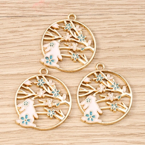 Three enamel rabbit and cherry blossom wreath pendants for DIY jewelry crafting