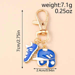 Detail view of baseball cleat and helmet keychain with dimensions and weight info