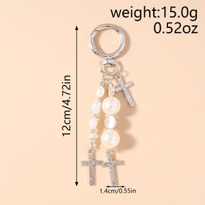 Detailed size chart showing the 12cm length and dimensions of the pearl cross keychain