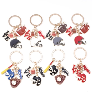 Set of 8 sports themed keychains with baseball and football enamel charms for bags