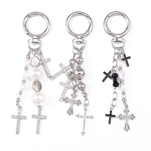 Elegant pearl and rhinestone cross keychains with silver beaded charms for bags