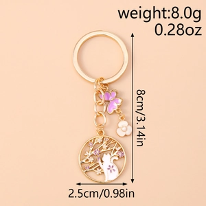 Dettaglio del portachiavi gatto e fiori con dimensioni 8cm e peso di 8g