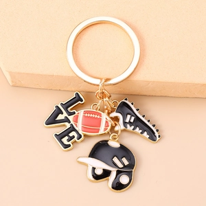 Detail of sports-themed keychain with mini football, helmet, shoe and love charms