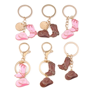 Lot de porte-clés bottes et chapeaux de cowboy style western en rose et marron doré