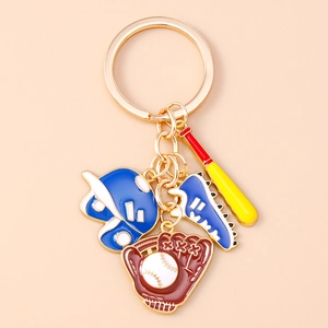 Detailed close-up of baseball theme keychain with helmet, glove, bat, and shoe charms
