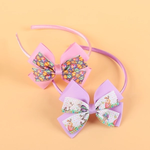 Two-pack Easter headbands for girls with colorful egg and bunny print bows in pink and purple