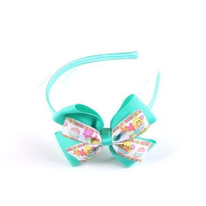 Mint green Easter headband for girls with rabbit print ribbon bow and festive egg patterns