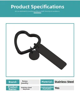 Macro view of black stainless steel square bar keychain with a heart shaped ring