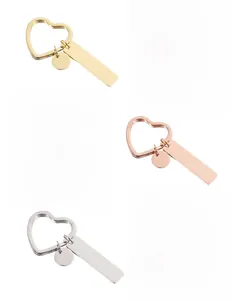 Polished stainless steel heart keychain with blank rectangular bar for custom engraving
