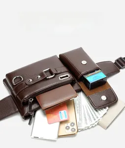 Macro detail of dark brown leather waist bag with multiple pockets and metal zippers