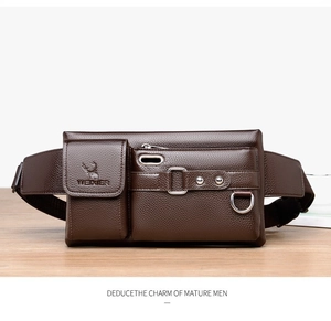 Detail of dark brown leather waist bag featuring textured grain and metal D-ring accent