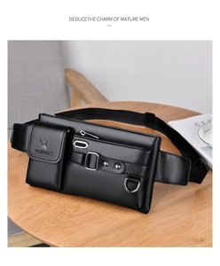 Detail view of black lychee grain leather waist bag with multiple pockets and metal hardware