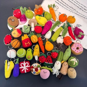 Handmade wool felt keychains featuring cute fruit, vegetable and food designs in 3D