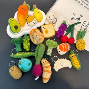 Handmade wool felt food keychains collection with cute smiling fruit and vegetable faces