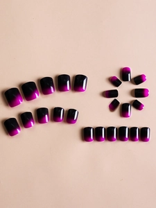 Flat lay of gradient black and purple press-on nails in 24 pieces set with glossy finish