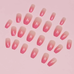 Detail of 24 pieces of glossy pink ombre press-on nails in various sizes
