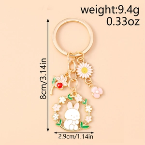 Detail showing enamel rabbit keychain dimensions and Weight marking in grams and ounces