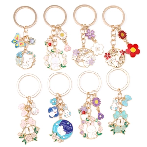 Exquisite enamel flower and rabbit metal keychains with sparkling decorative charms