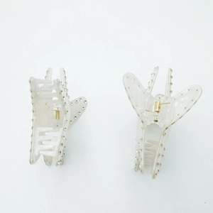 Elegant starfish-shaped hair claw clips with colorful rhinestones in a two-piece set